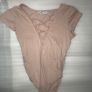 Pink lace up body suit